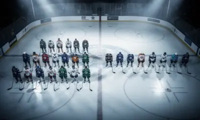Calgary Flames players celebrate a goal against the Carolina Hurricanes at Scotiabank Saddledome in