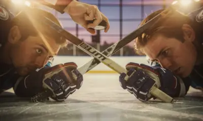 Carolina Hurricanes players celebrating a goal during the 2019-20 NHL regular season at PNC Arena