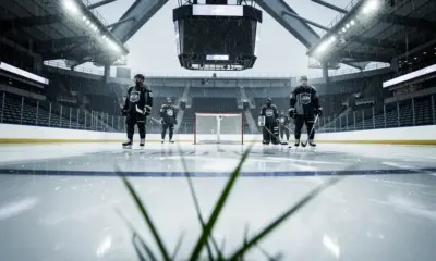 Columbus Blue Jackets players on the ice at Nationwide Arena during overtime loss to Utah Mammoth
