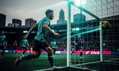 Jack Hughes celebrating a hat trick goal for the New Jersey Devils against the Rangers at Prudential