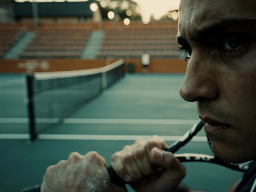 Tennis coach and player discussing strategy courtside illustrating Tennis Coaching Changes in 2026