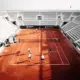 Players competing in Davis Cup Tennis Nations League tie on clay court in 2026