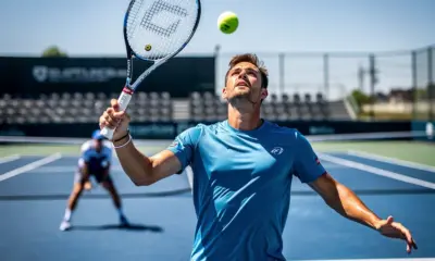 Novak Djokovic serving during a 2026 ATP Grand Slam match on center court