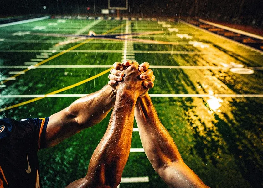 Tennis player and coach discussing strategy courtside, representing 2026 Tennis Coaching Changes on clay