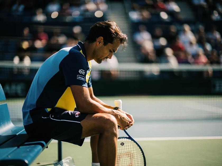 Tennis player walking off court representing 2026 Tennis Retirement News and career farewells